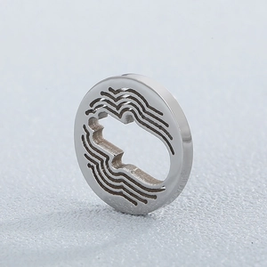 Modern silver stainless steel round pendant featuring unique cutout and wave texture