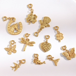 Detailed set of 18K gold plated stainless steel charms including angel and clover shapes