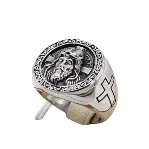Retro stainless steel religious ring for men featuring Jesus and cross relief patterns
