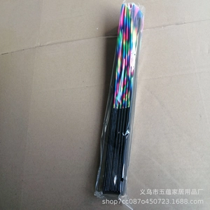 Detail shot of folded martial arts fan with colorful rainbow patterns in a protective sleeve