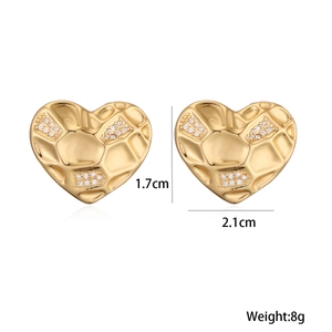Detailed size view of gold hammered heart earrings with crystals, 1.7cm by 2.1cm size