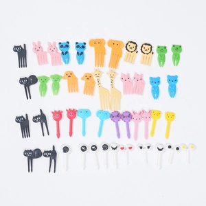 Detailed array of assorted colorful mini animal-shaped food picks for kids' lunch boxes