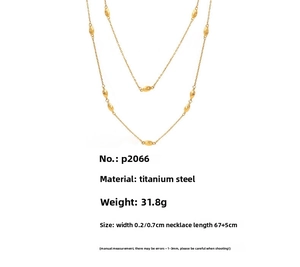 Detail of gold titanium double-layer necklace with beads showing 67+5cm length and weight