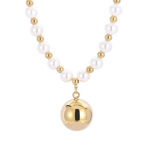French style pearl necklace with a large gold hollow ball pendant on white background