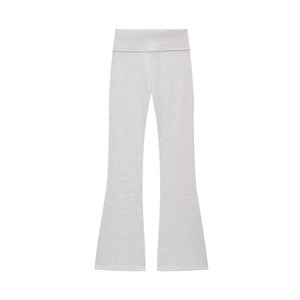 Detailed view of light gray high-waisted flared trousers in soft knit blend fabric