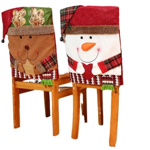 Christmas chair covers featuring reindeer and snowman designs in soft white fleece fabric