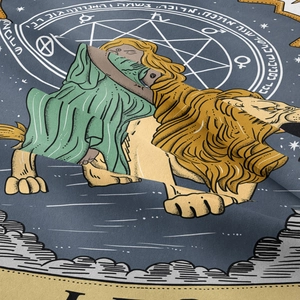 Macro shot of a Leo zodiac tapestry showing a woman riding a lion with mystic symbols