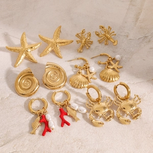 Gold-plated ocean theme earring set featuring starfish, lobster, and pearl charms