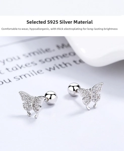 Close-up of S925 sterling silver butterfly stud earrings with sparkling crystals and screw back
