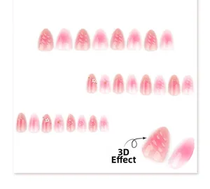 Detail of 3D pink gradient press-on nails featuring embossed texture and pearl flower art