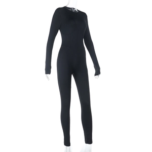 Front view of a sleek black long sleeve jumpsuit with a waist-defining slim fit design