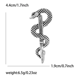 Detailed view of silver snake brooch with exact dimensions of 4.4cm by 1.9cm and 6.5g weight