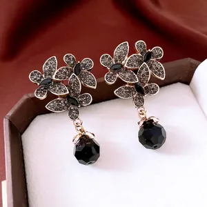Vintage floral drop earrings with dark grey crystals and black faceted bead charms
