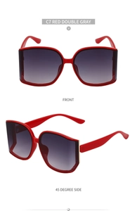 Detail of red curved sunglasses with metal accents and gradient grey lenses shown from two angles