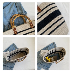 Detailed close-up of woven tote bag featuring natural bamboo handles and spacious interior