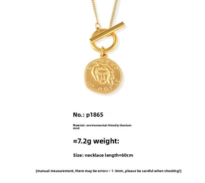 Detail of 18k gold plated stainless steel OT toggle necklace with portrait pendant