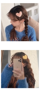 Plush heart hair clips in candy pink and yellow colors worn on hair for sweet girls