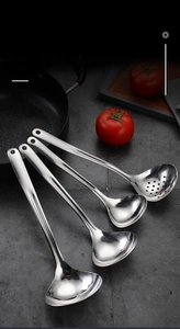 Close-up of durable 304 stainless steel soup ladles and colander set with hanging holes