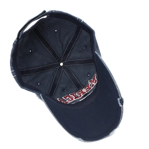 Navy blue distressed denim baseball cap with America embroidery and vintage ripped detail