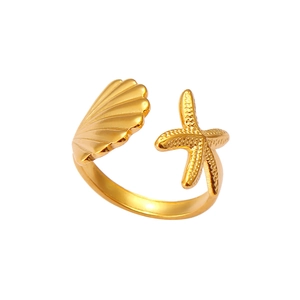 Detailed view of adjustable golden open ring featuring a seashell and starfish design