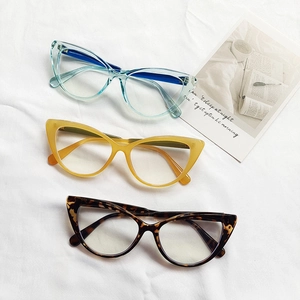 Retro cat-eye black frame glasses for women in transparent blue, yellow, and tortoiseshell
