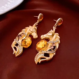 Boucles d'oreilles tête de cheval vintage avec pierre ambre et cristaux étincelants