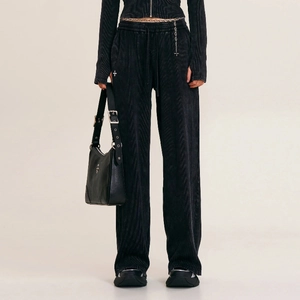 Vintage gothic style loose black sports trousers with a matching shoulder bag