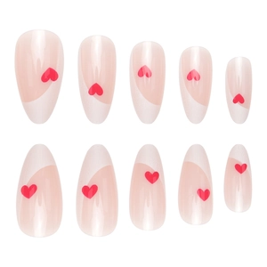 Almond press-on nails with white French tips and red heart accents on pink base