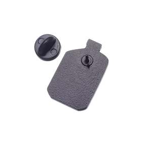 Close-up of black alloy brooch back with matching secure rubber butterfly clutch backings