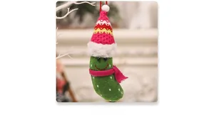 Christmas banana plush pendant with green felt body, red scarf, and a festive Santa hat