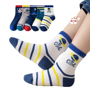 5-pack children's crew socks with space theme patterns and model wearing view