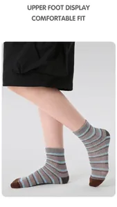 Detail of blue striped knit socks featuring brown contrast toes and a breathable mesh texture