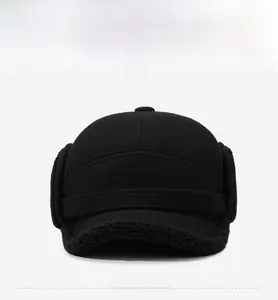 Front view of wool baseball cap featuring ear flaps and black fleece lining detail