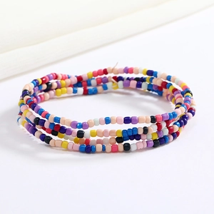 Detail view of multi-layer colorful glass seed beads with bohemian stretchy waist chain design