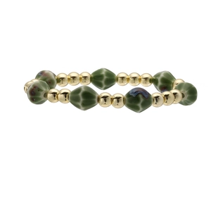Minimalist green rhombus ceramic bead bracelet with golden metallic accents on white base