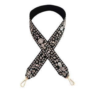 Black jacquard wide shoulder strap with floral embroidery and gold metal hooks