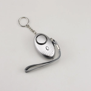 Silver 133dB personal safety alarm with LED flashlight, keychain, and hand strap