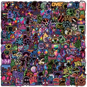Close-up of waterproof neon graffiti stickers for laptops with vibrant cyberpunk patterns