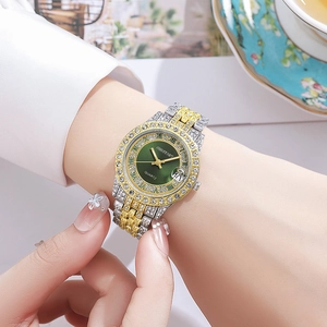 Montre femme élégante bicolore or-argent avec cadran vert et lunette sertie de diamants