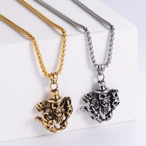 Collana con ciondolo teschio gotico in finiture oro e argento con catena stile punk