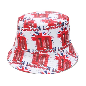 Detailed close-up of white bucket hat featuring London phone booth and Union Jack prints