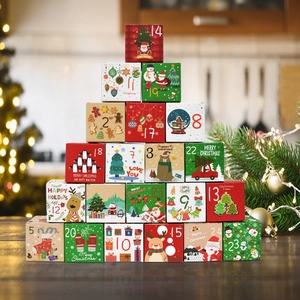 24-day Christmas advent calendar gift boxes in red and green for holiday countdown