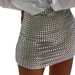 Detail shot of silver sequin bodycon mini skirt featuring shiny square rhinestones