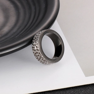Sleek 8mm grooved hammered titanium ring for men in dark gunmetal grey finish