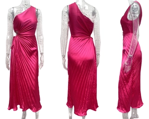 Detail of rose pink one-shoulder dress featuring waist cutout and pleated satin fabric