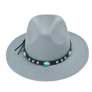 Detail of grey felt fedora featuring black leather band with silver studs and turquoise gems