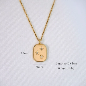 Detailed view of golden star necklace with 13x9mm pendant size and technical parameters
