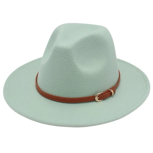 Detail of mint green cashmere fedora hat with a brown leather belt and gold buckle