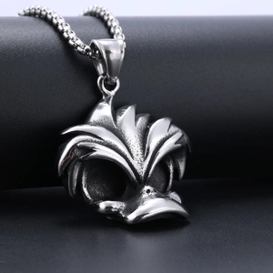 Vintage silver skull bird pendant in stainless steel with a fine chain necklace