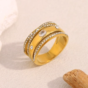Macro view of 18K gold-plated stainless steel wide ring with zircon inlay detail